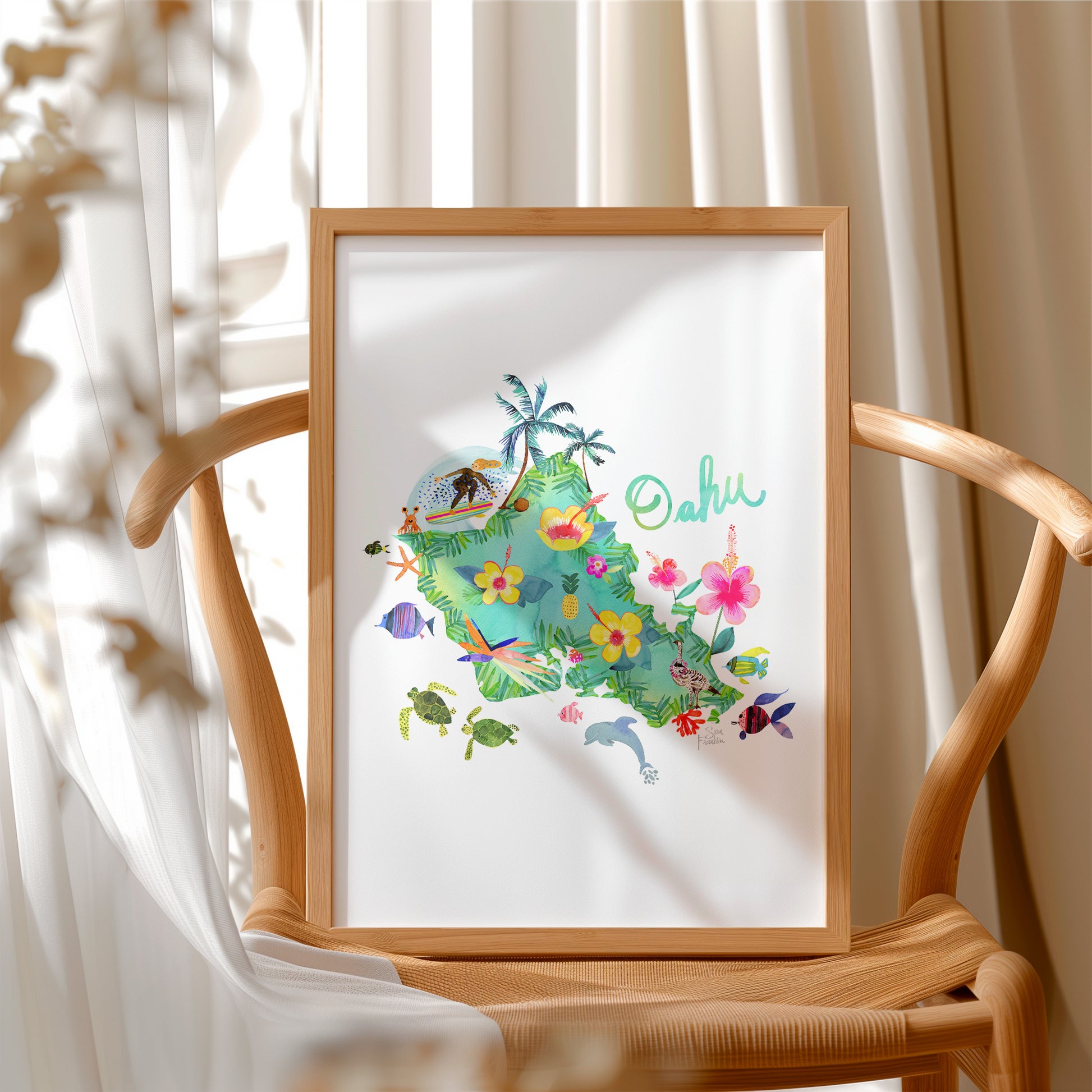 a picture frame with a picture of a tropical island