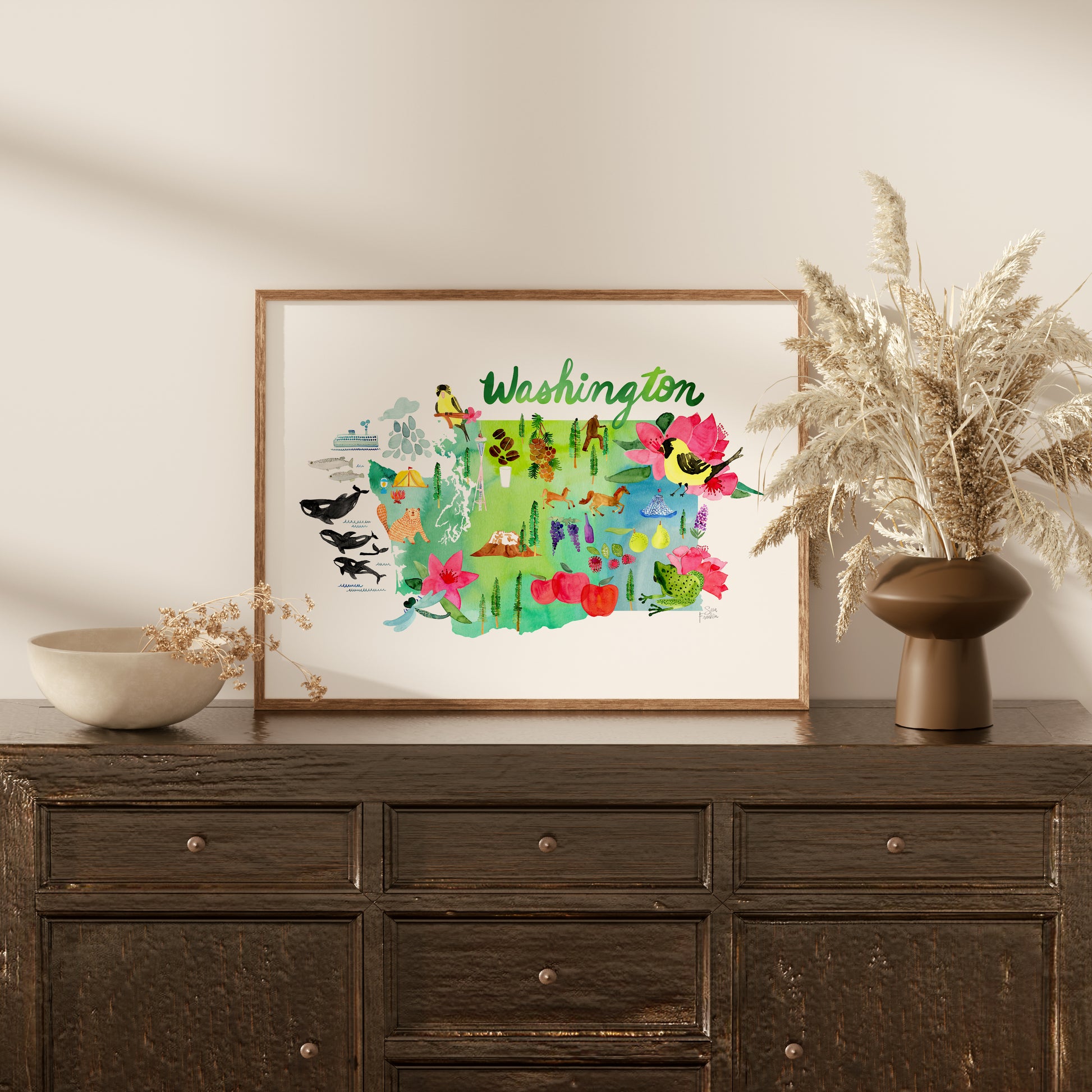 a wooden dresser with a vase of flowers on top of it