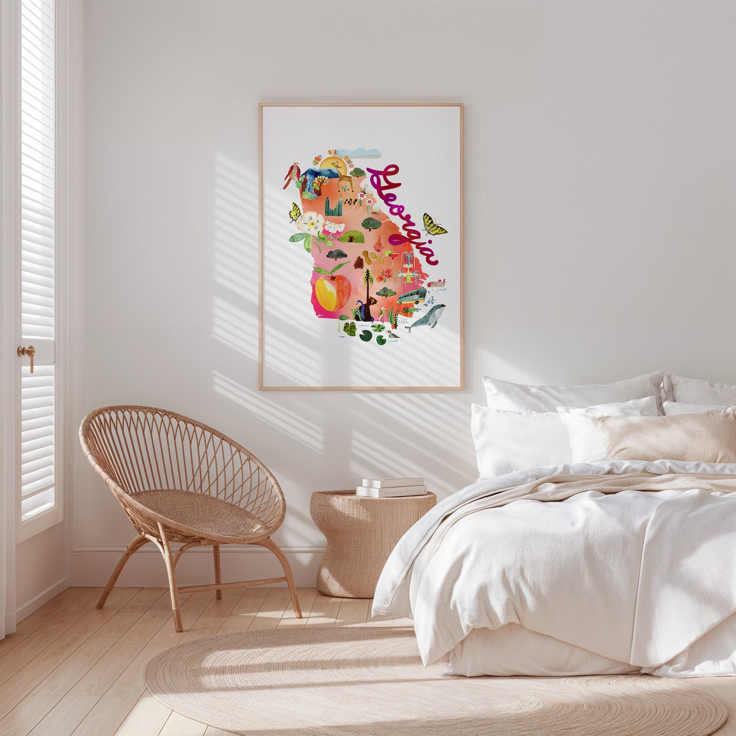 a bedroom with a bed, chair and a picture on the wall