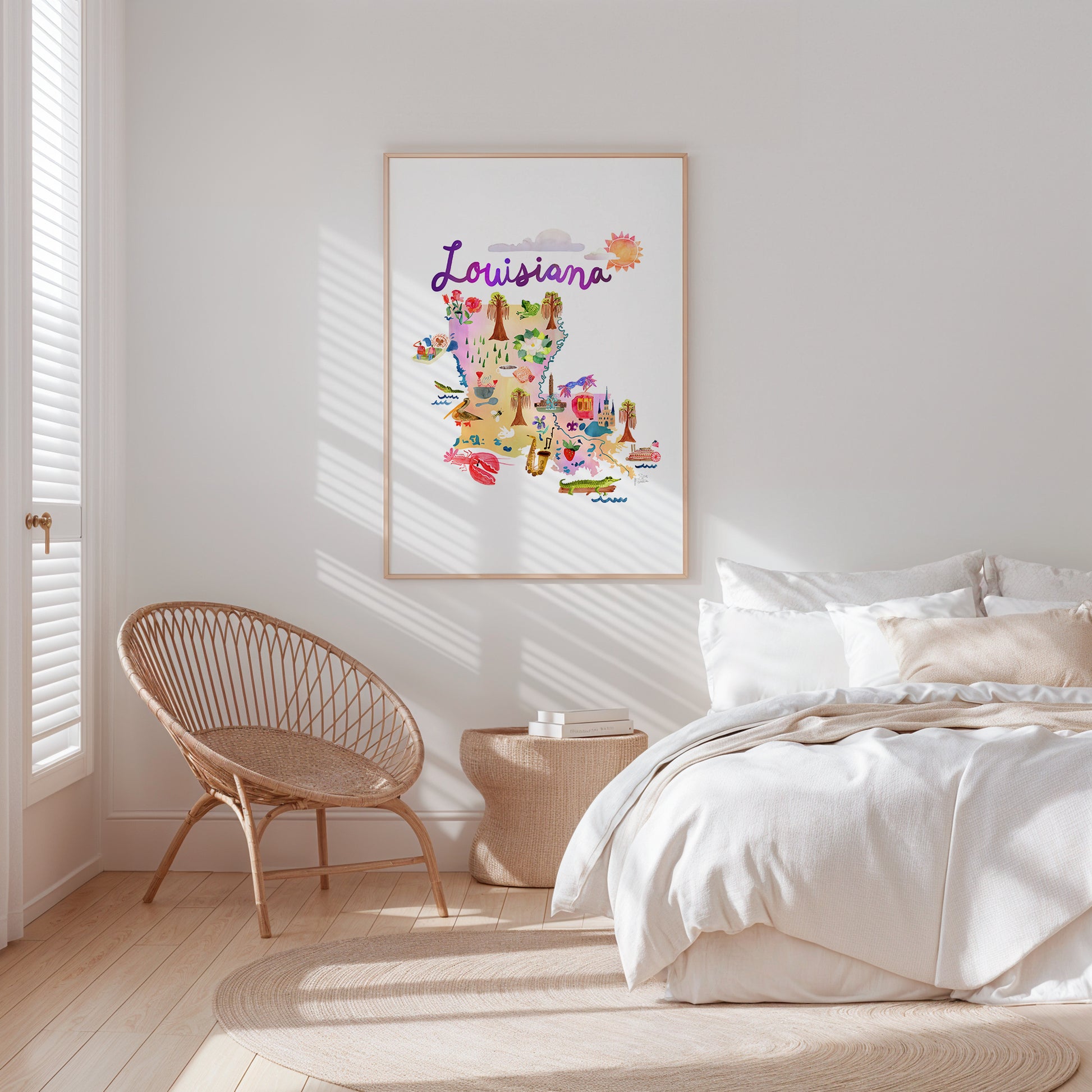 a bedroom with a white bed and a white chair