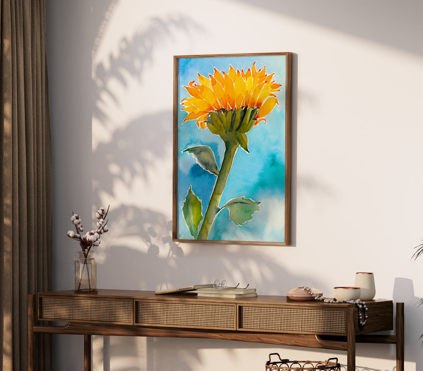 a painting of a yellow flower on a white wall